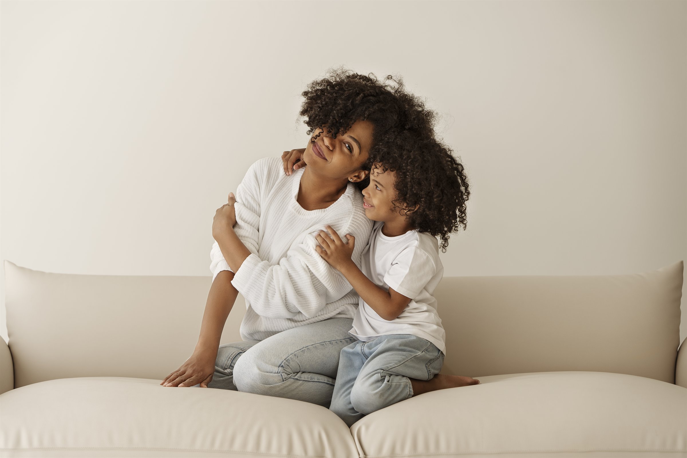 A parent and child at home